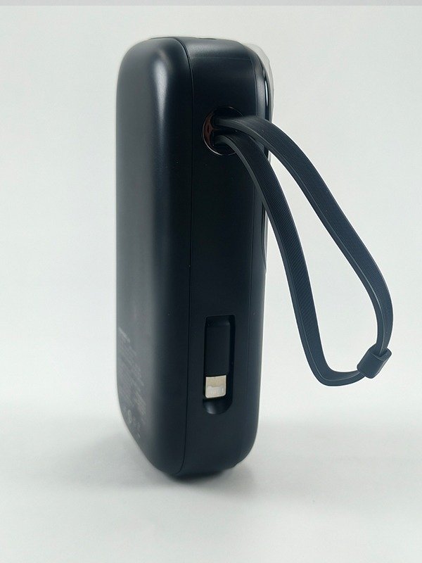 NOHON NX-P02 white power bank with built-in charging cables and digital display.