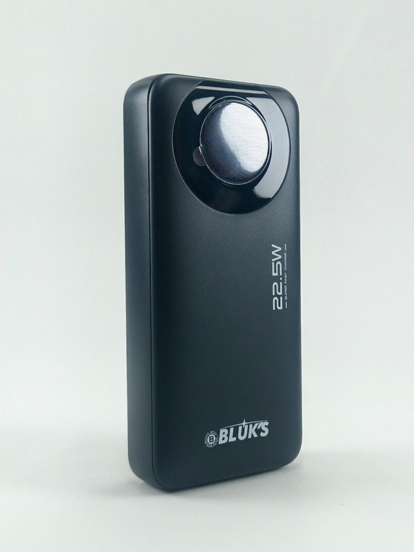 Slim white BX-306 20000mAh power bank showing multiple ports and a compact, portable design.