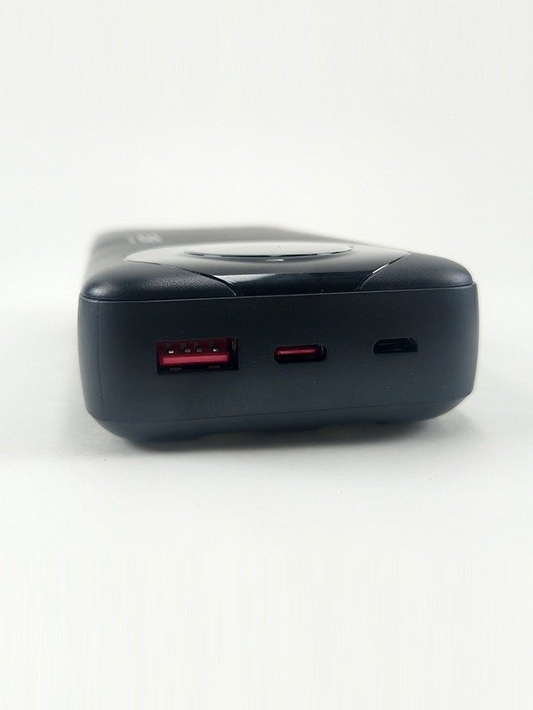 Slim white BX-306 20000mAh power bank showing multiple ports and a compact, portable design.