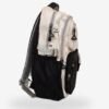 Black 2 Fashion black and beige backpack front view showing 16 x 12 inch dimensions with smiley mini pouch