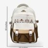Sun Start Sizes Cream and brown cartoon-print backpack front view showing 16 x 12 inch dimensions